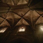 Intricate gothic architecture of Saint-Maximin Basilica with stunning vaulted ceilings and stained glass windows.