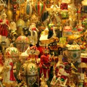 A vibrant display of diverse Christmas ornaments in a Salzburg, Austria shop window.